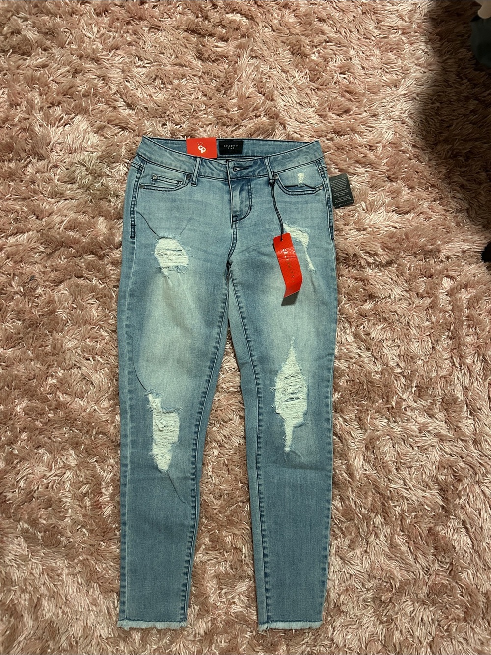 Celebrity Pink Light Blue Distressed Skinny Jeans